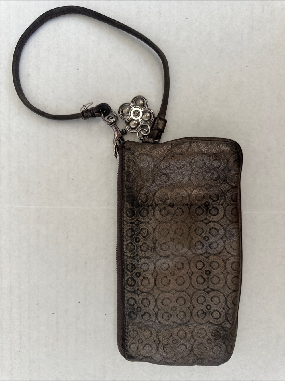 BRIGHTON Brown Signature Pattern Wristlet with Floral Charm